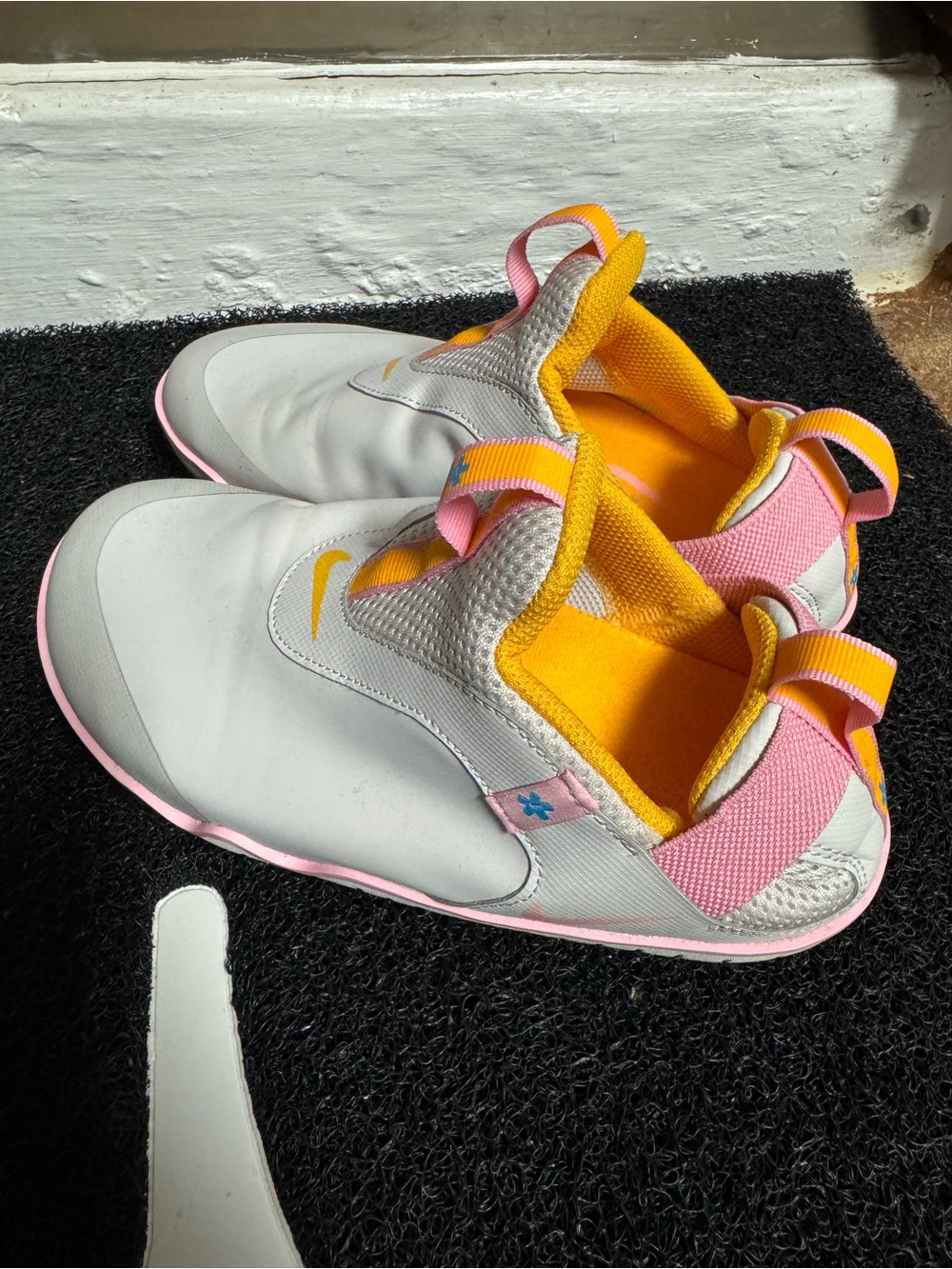 Nike Women’s Nursing Slip-On Sneakers in Grey, Pink & Yellow